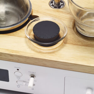 Close-up of the mini fridge on the Barisieur Coffee Maker for storing milk overnight.