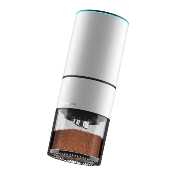 Joy Resolve Groove Compact Electric Grinder in white with coffee grounds in the container and LED light ring